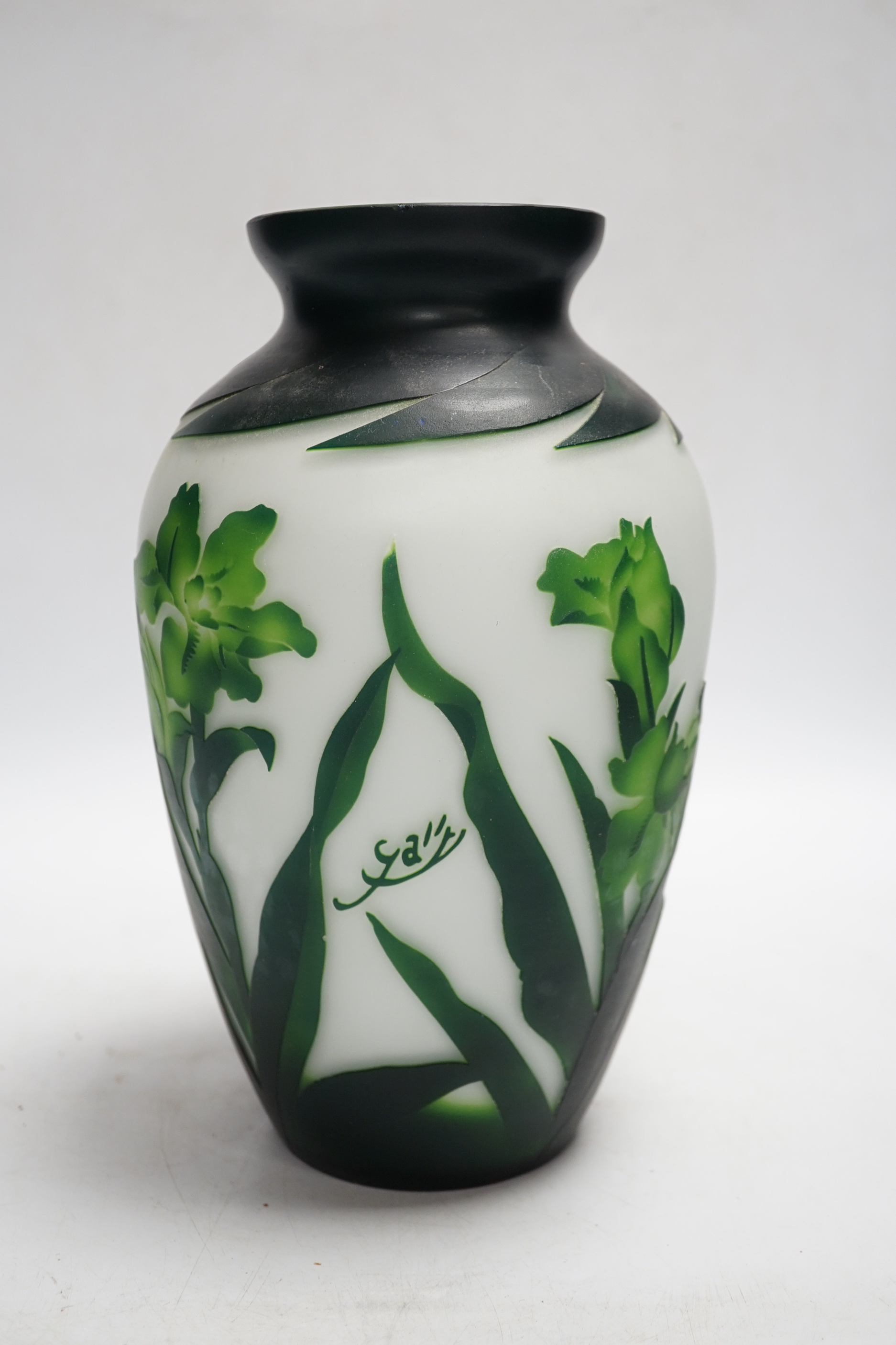 An Emile Galle style cameo glass vase, irises on white ground, 25cm high